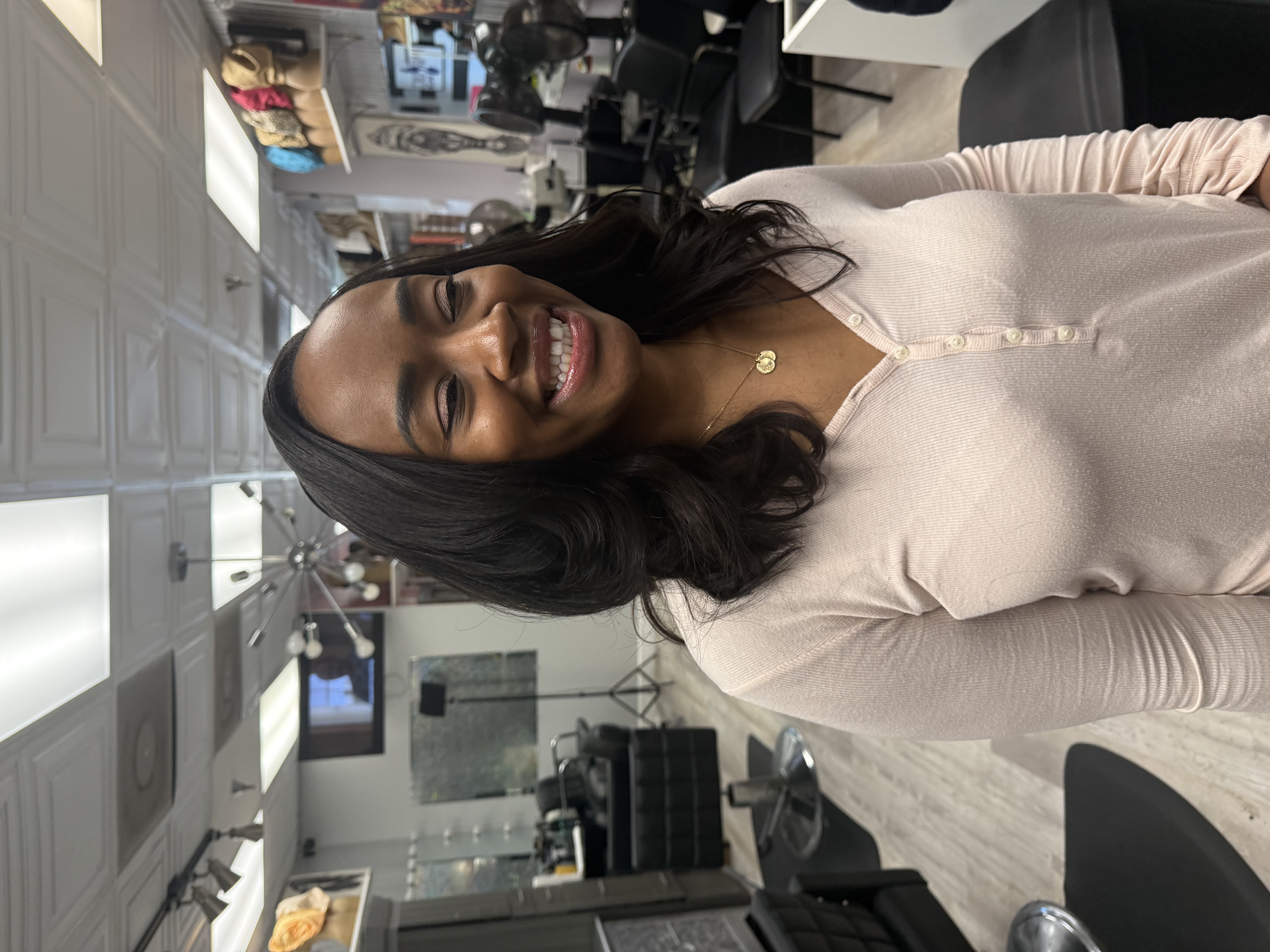 Client wearing body wave styled hair