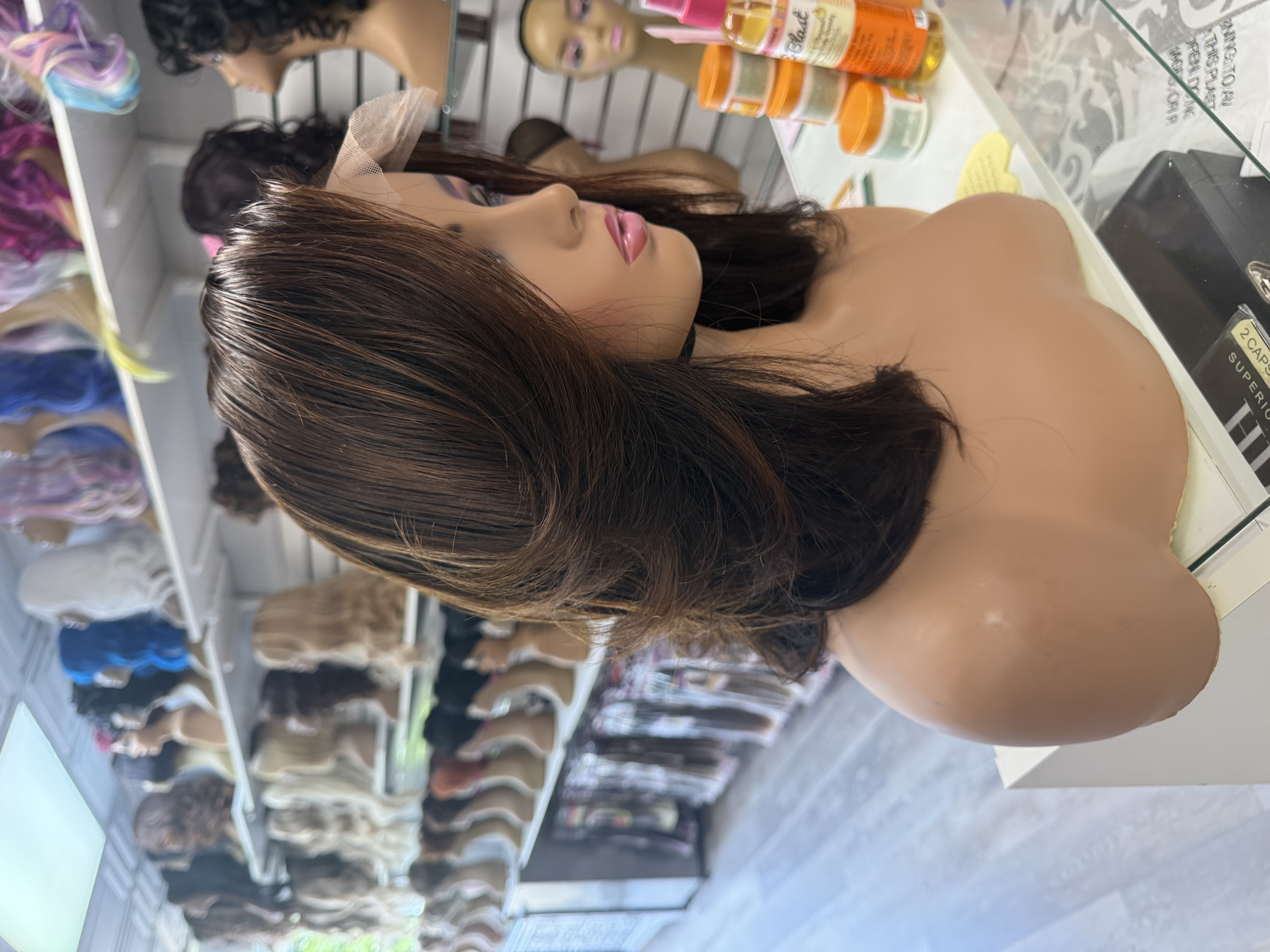 Straight hair bundles on display at the salon