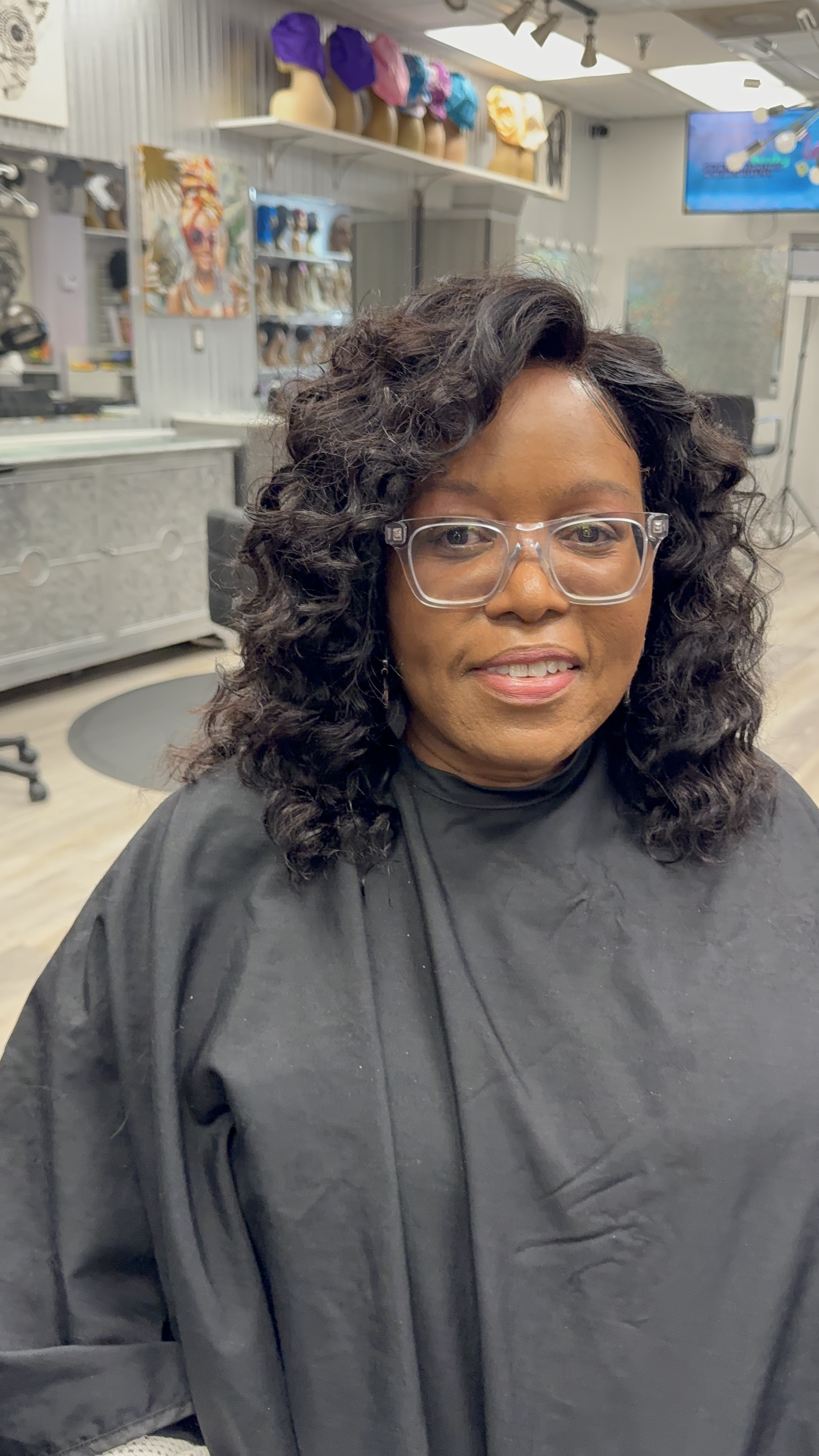 Client wearing water wave textured hair
