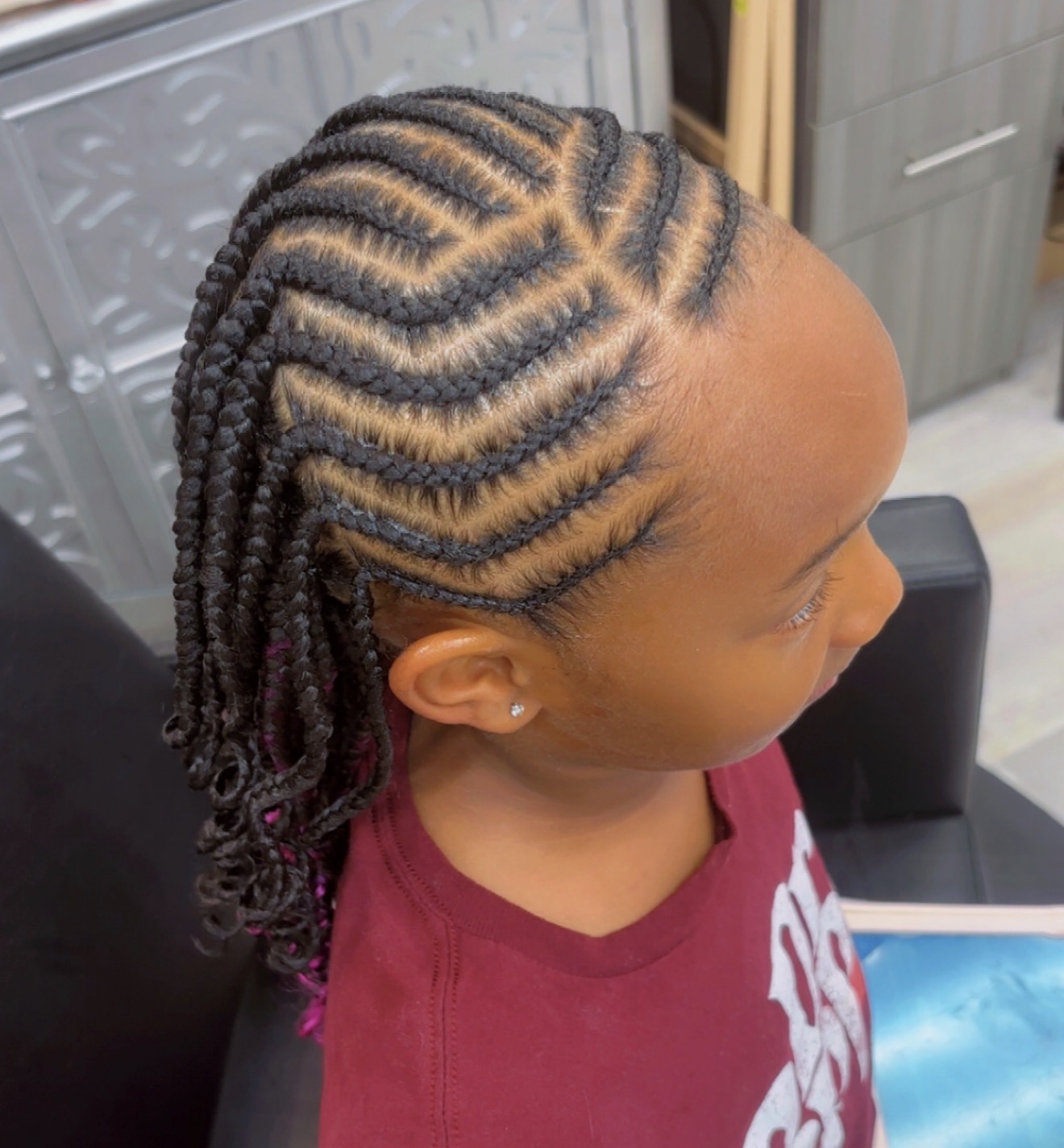 Intricate protective braid styling