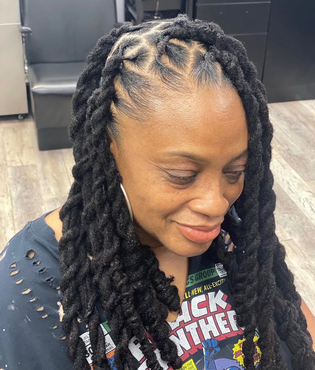 Client with a finished natural hair style at Lovette Hair salon