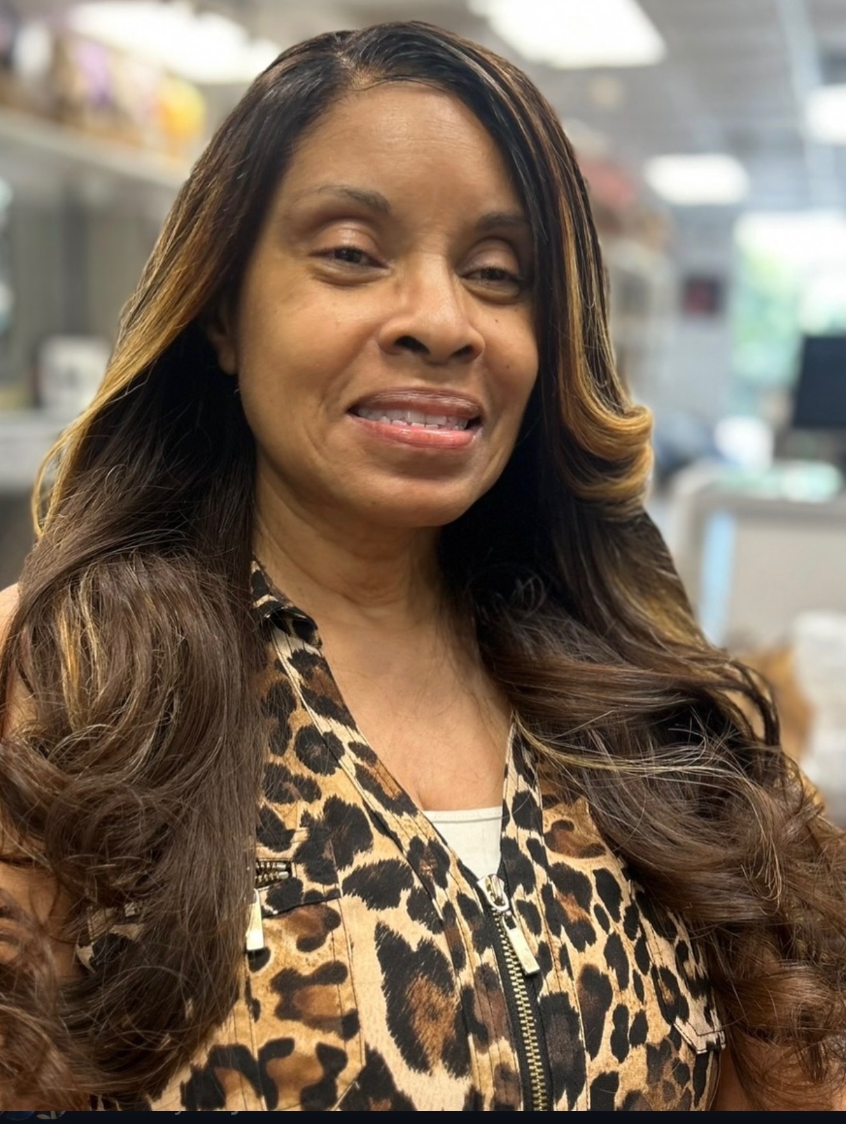 Highlighted sew-in weave with voluminous waves