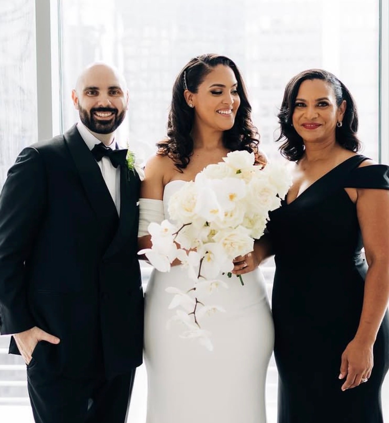 Wedding party with formal up-do and event-ready styling